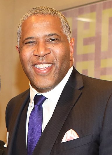 What is the name of the private equity firm founded by Robert F. Smith?