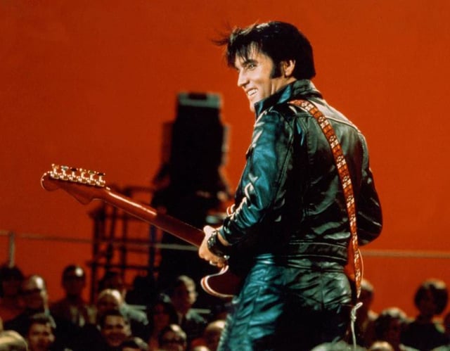 What was Elvis Presley's first feature film?