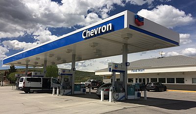 In which year did Chevron merge with Texaco?