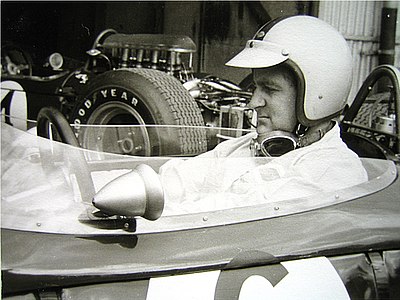 How many podium finishes did Hulme achieve in his F1 career?