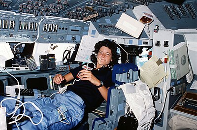 What was the mission number of Sally Ride's first spaceflight?