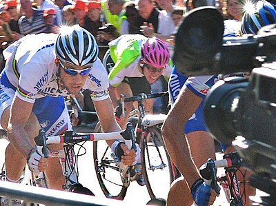 In which year did Mark Cavendish win the Men's road race at the road world championships?