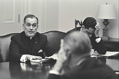 What role did Hesburgh hold in atomic energy debates?