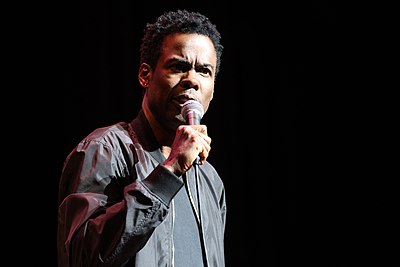 What was the name of Chris Rock's critically acclaimed talk show on HBO?