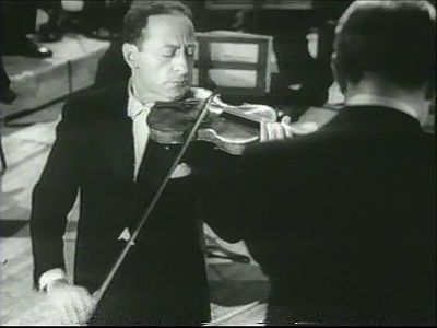 Which famous violinist was a contemporary of Heifetz?