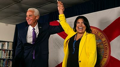 Who defeated Crist in his home district, the St. Petersburg-based 13th, in 2016?