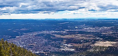 What is a major industry in Flagstaff due to its proximity to several natural attractions?