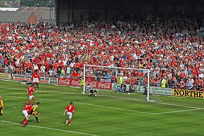 In which stadium does Wrexham A.F.C. play their home games?