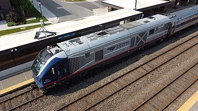 What types of trains serve Naperville?