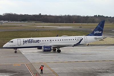 What is the name of JetBlue's premium class offering?