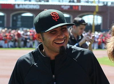 What are the teams that Sergio Romo had played for? [br](Select 2 answers)