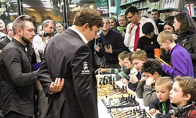 When did Karjakin win individual gold in the Chess Olympiad for Russia?