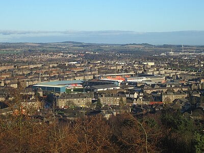 Where does Dundee F.C. play its home matches?