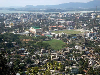 What is the primary language spoken in Guwahati?
