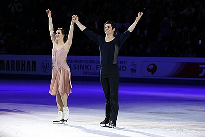 How many times did Scott Moir and Tessa Virtue become Olympic champions?