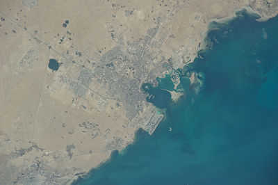 What is the name of the famous artificial island in Doha?