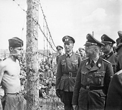 What type of symbolism and rituals did Himmler incorporate into the SS?