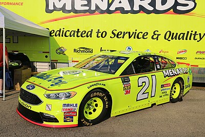 Which team did Paul Menard drive for in 2014?
