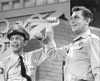 What was Andy Griffith's character's profession in A Face in the Crowd?