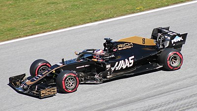 What type of Chevrolet does Grosjean drive in IndyCar?
