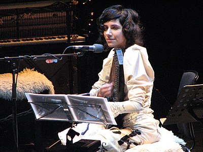 What was the first album PJ Harvey released as a solo artist?