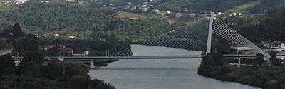 What is the name of the iconic Coimbra bridge?