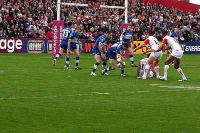 What is the current name of Wigan Warriors' home stadium?