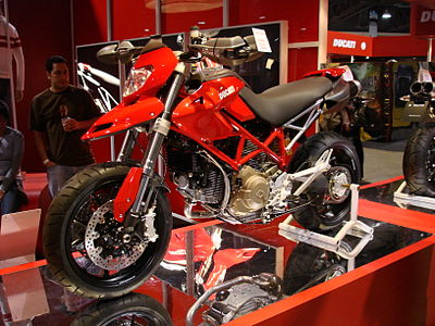Which automotive manufacturer directly owns Ducati?