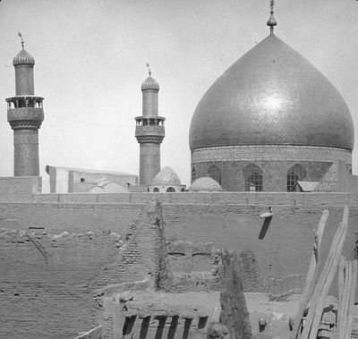 What is the distance between Najaf and Baghdad?