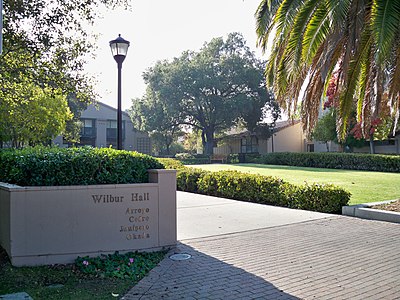 What was Ray Lyman Wilbur's role at Stanford University?