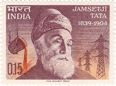 What was the denomination of the first Indian coin issued bearing the portrait of Jamsetji Tata?
