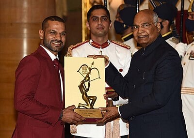 In which year did Dhawan win the Asia Cup with India?