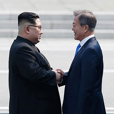 How many hours did Moon Jae-in lower the maximum workweek to?