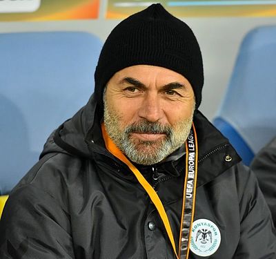 Aykut Kocaman's last years in football were speculated to be for the purpose of reaching which goal barrier?