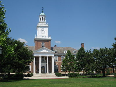 Which philanthropist provided the initial funding for Johns Hopkins University?