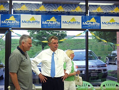 How did Terry McAuliffe begin his career?