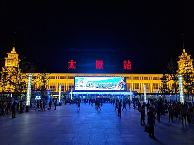 In which year is Taiyuan's permanent population recorded as 5,390,957?