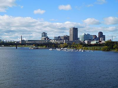 What is the largest city in the Outaouais administrative region?