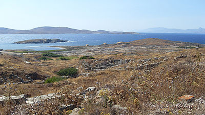 How is Delos connected to the development of Greek architecture?