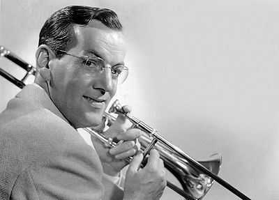 How many number one records did Glenn Miller score in four years?