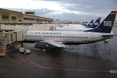 Which two airlines did USAir acquire in the late 1980s?