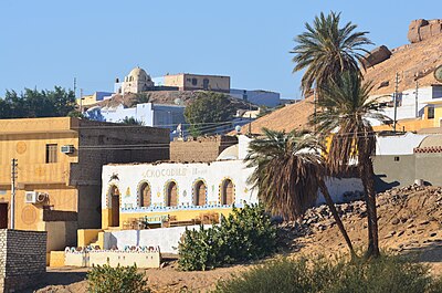 What famous ancient temple is located near Aswan?