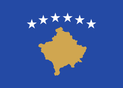 Which team did Kosovo play in their first official match?