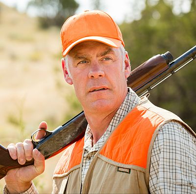 What was the military rank of Ryan Zinke upon his retirement?