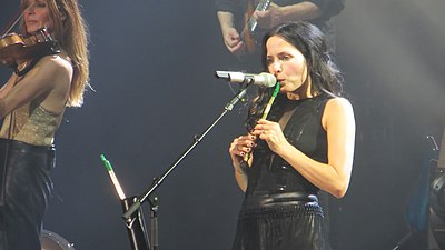 What genre is not part of Andrea Corr's music with The Corrs?