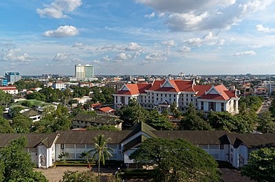 Which neighboring country is Vientiane closest to?