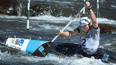 Which canoe partner did David win the C2 World Championship with?