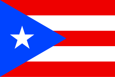 What is the primary color of the Puerto Rico national football team's home jersey?