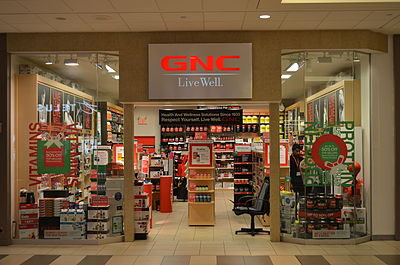 Where was GNC's first store located?