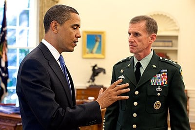 Which British General temporarily assumed McChrystal's command?